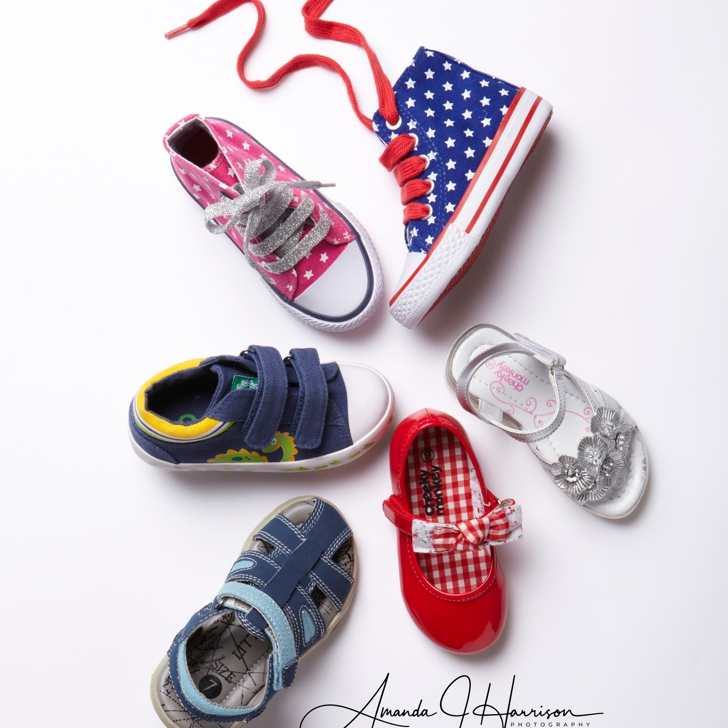 Commercial Photography Image of several children's shoes arranged in a circle